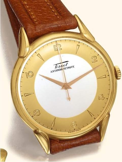 Tissot Antimagnétique wristwatch of the 1930s, two-tone dial signed Tissot Antimagnetique, gold-plated case, brown leather strap